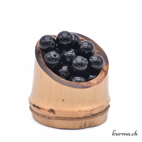 Perle Tourmaline Noire 10mm 1 disponible dans la boutique en ligne Kûrma. Votre magasin de pierre et minéraux en suisse