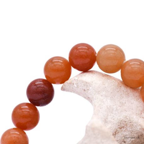 Acheter Bracelet Aventurine Orange perles 10mm - N°16088-2 dans la boutique en ligne Kûrma. Spécialisé dans des pierres de qualité directement importer depuis les artisans lapidaires.