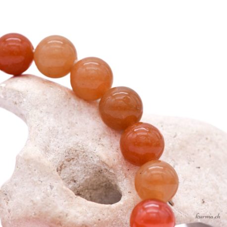 Acheter Bracelet Aventurine Orange perles 10mm - N°16088-3 dans la boutique en ligne Kûrma. Spécialisé dans des pierres de qualité directement importer depuis les artisans lapidaires.
