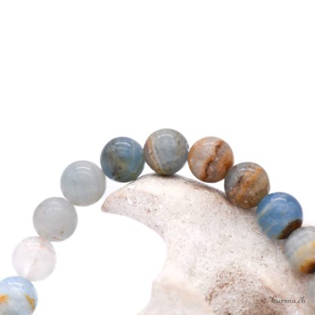 Acheter Bracelet Calcite Bleue perles 8mm - N°16101-1 dans la boutique en ligne Kûrma. Spécialisé dans des pierres de qualité directement importer depuis les artisans lapidaires.
