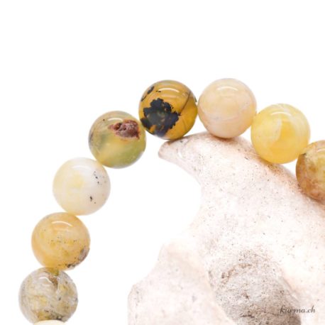 Acheter Bracelet Opale Verte perles 10mm - N°16137-2 dans la boutique en ligne Kûrma. Spécialisé dans des pierres de qualité directement importer depuis les artisans lapidaires.