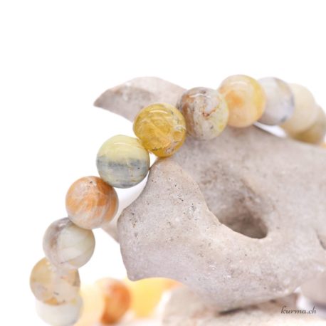 Acheter Bracelet Opale Verte perles 10mm - N°16137-3 dans la boutique en ligne Kûrma. Spécialisé dans des pierres de qualité directement importer depuis les artisans lapidaires.