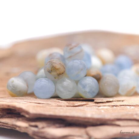 Perle Calcite Bleue 6mm sur Fil 40cm- N°17480-1 disponible en ligne et dans la boutique Kûrma.